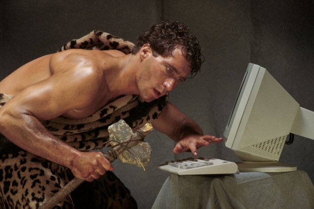 Caveman with computer