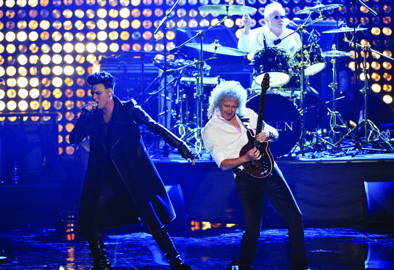 BELFAST, NORTHERN IRELAND - NOVEMBER 06: Singer Adam Lambert performs with Brian May and Queen onstage during the MTV Europe Music Awards 2011 live show at at the Odyssey Arena on November 6, 2011 in Belfast, Northern Ireland. (Photo by Getty Images/Getty Images) *** Local Caption *** Adam Lambert; Brian May
